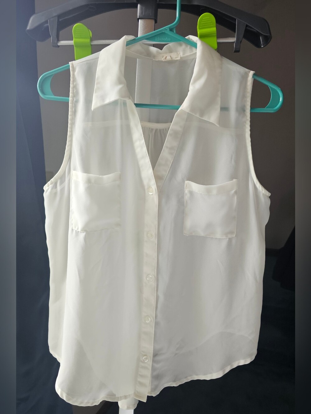 Ivory Sleeveless Button-Front Blouse